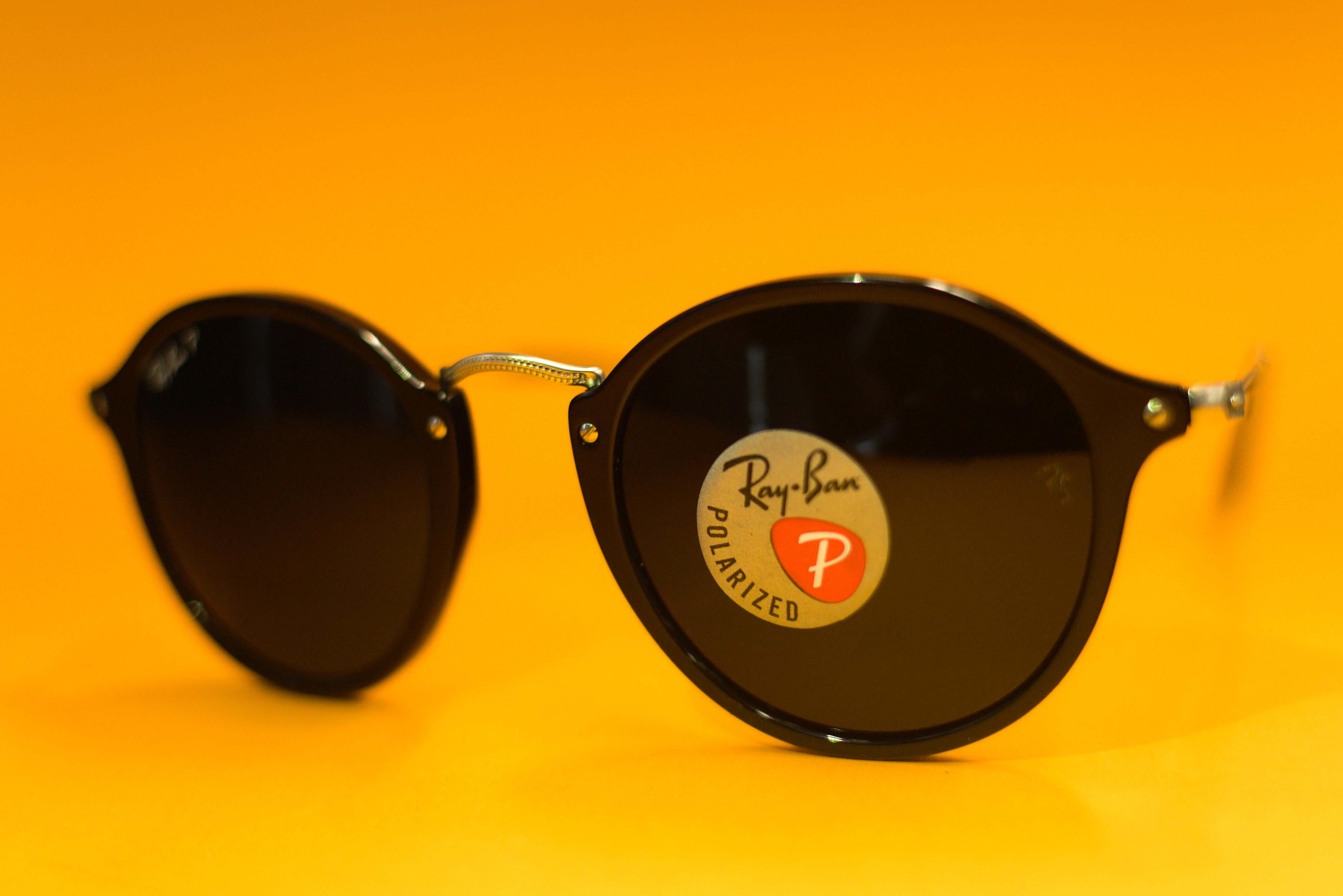 How to spot fake ray ban sunglasses Ray-Ban RB2180 601/71 Round in Black Colour